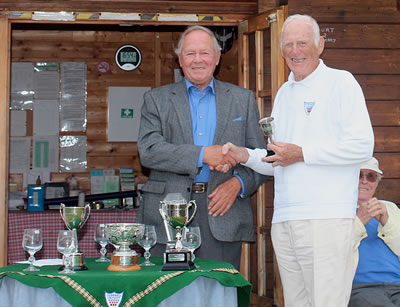 Golf Croquet Singles Knockout Tournament Winner, Stephen Read 
receives The Cup from Howard Rosever (President)